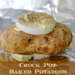 Crock Pot Baked Potatoes with a slice of sweet onion