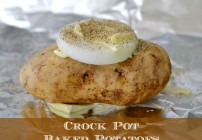 Crock Pot Baked Potatoes with a slice of sweet onion