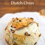 The best No-Knead Garlic Rosemary Bread baked in a Dutch Oven that you will ever eat. So easy to make even a first time bread baker will be able to enjoy this artisan bread recipe at home via flouronmyface.com