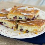 Holiday recipes using Crescent rolls- Cranberry Orange Cheesecake Bars via flouronmyface.com #ad