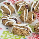 No Bake Christmas Cookie recipe made with oats, peanut butter, cinnamon and dried cranberries via flouronmyface.com