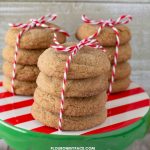 3 stacks of homemade Big soft ginger cookies on a holiday dessert stand