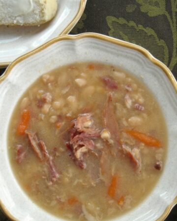 A bowl of ham and white bean soup.