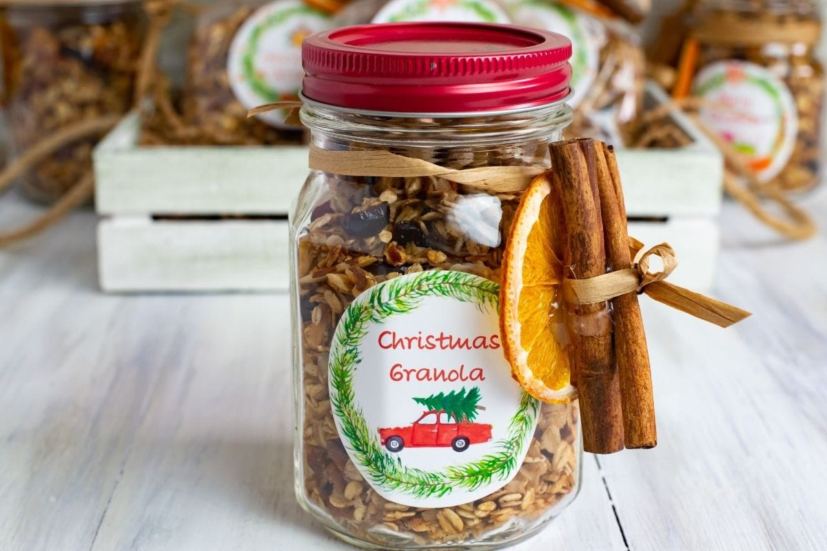 Granola in a mason jar decorated for Christmas.