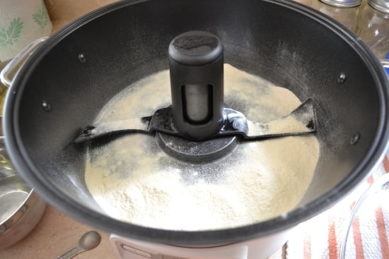 Adding powdered pectin in the bottom of the Jam and Jelly Maker appliance.