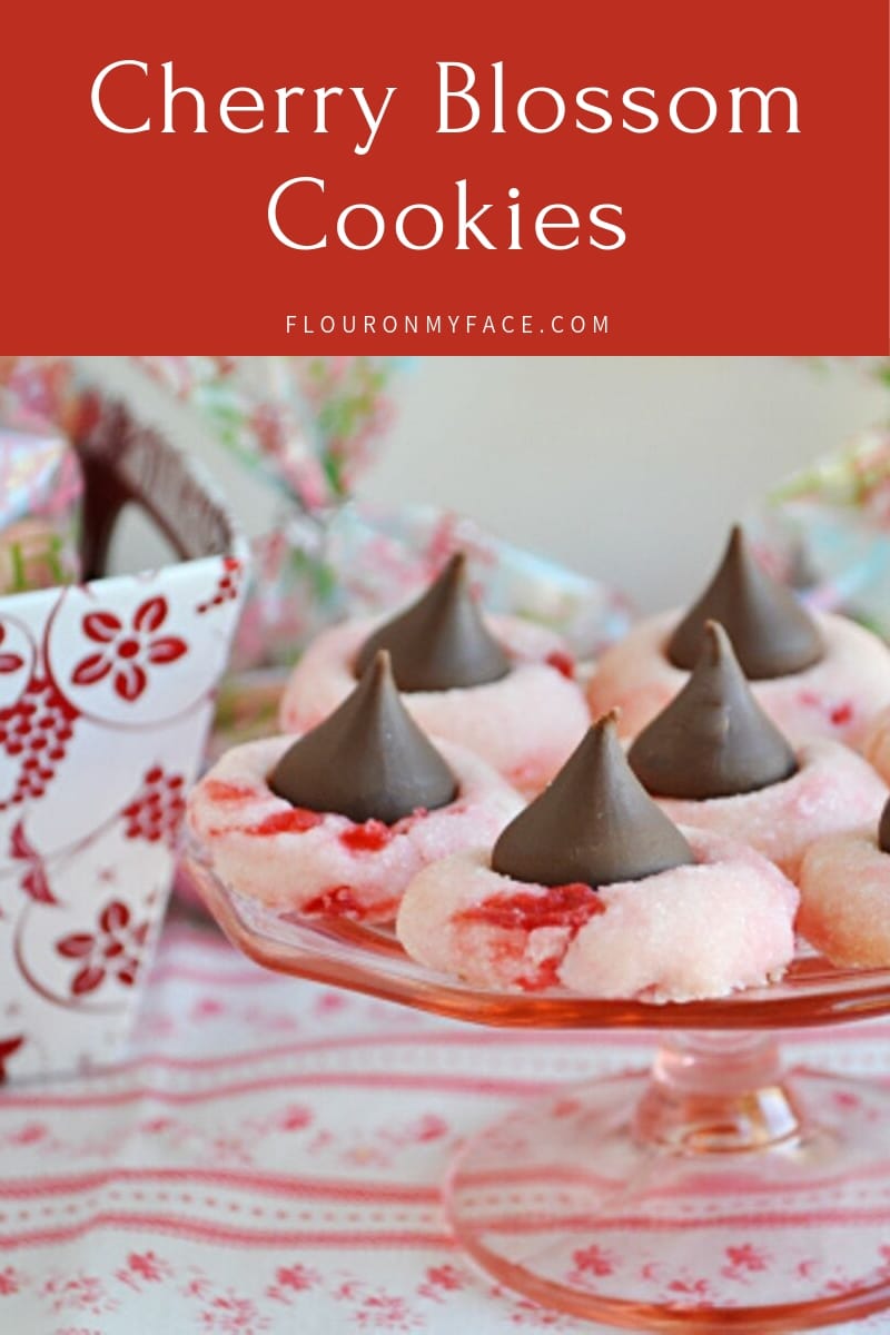 image of homemade Cherry Blossom Cookies on a pink glass cake stand