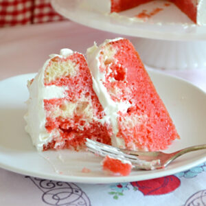 A slice of Strawberry Jello Poke Cake