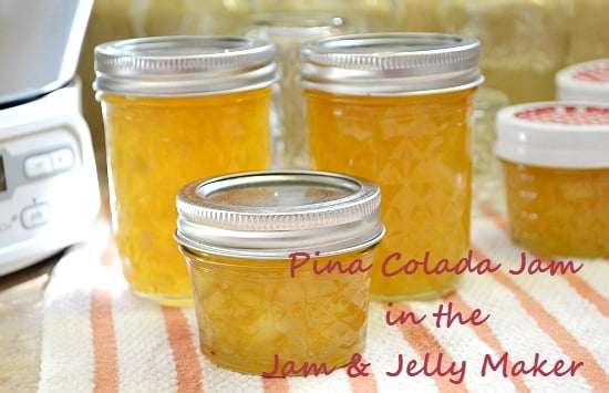 Pina Colada Jam in canning jars on the counter.