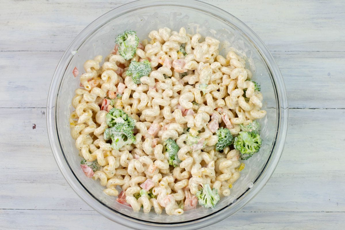 A large glass bowl filled with Hidden Valley Ranch Pasta Salad.