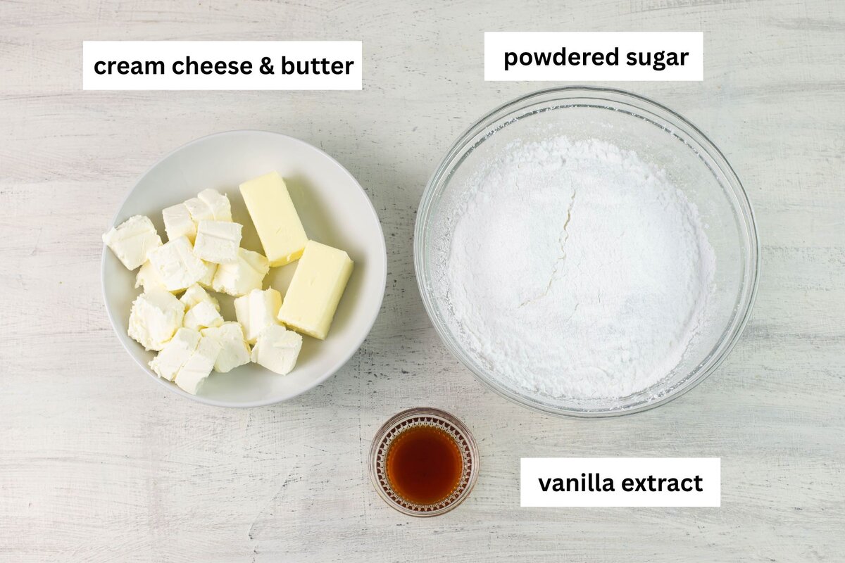 Cream cheese frosting ingredients in bowls.