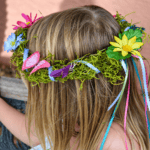 A Diy Woodland Fairy Crown on a small child's head.