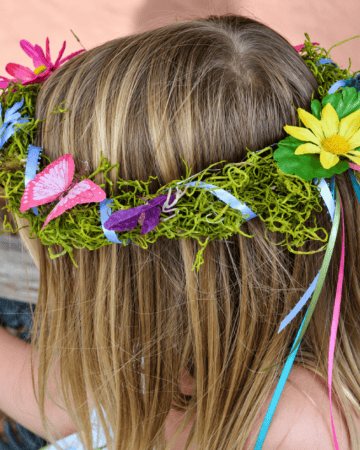 A Diy Woodland Fairy Crown on a small child's head.