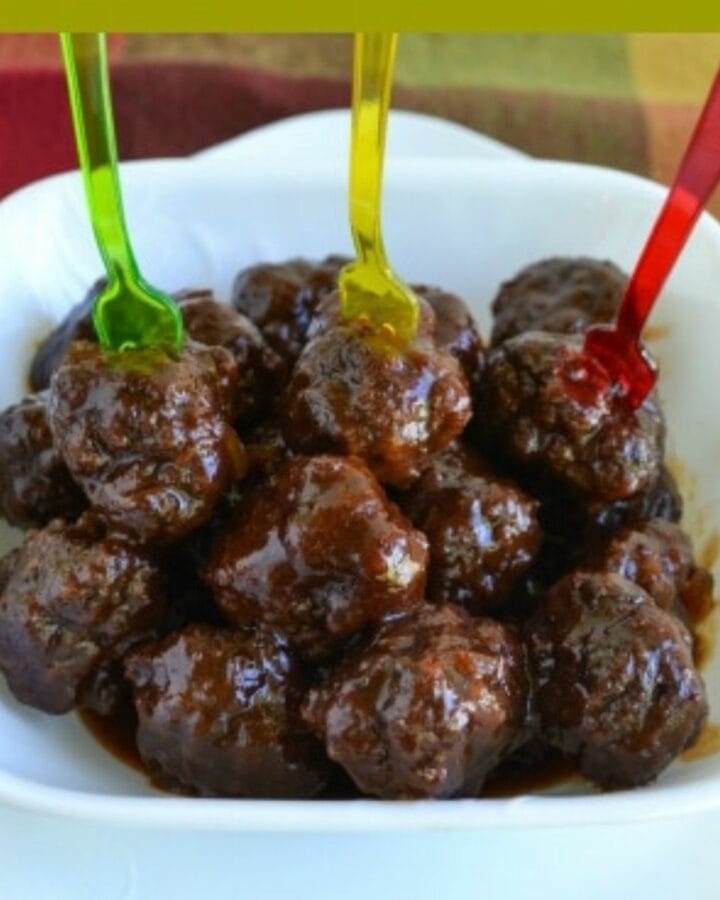 Grape Jelly Meatballs with appetizer forks.