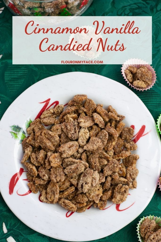 A holiday plate with a mound of Cinnamon Vanilla Candied Nuts