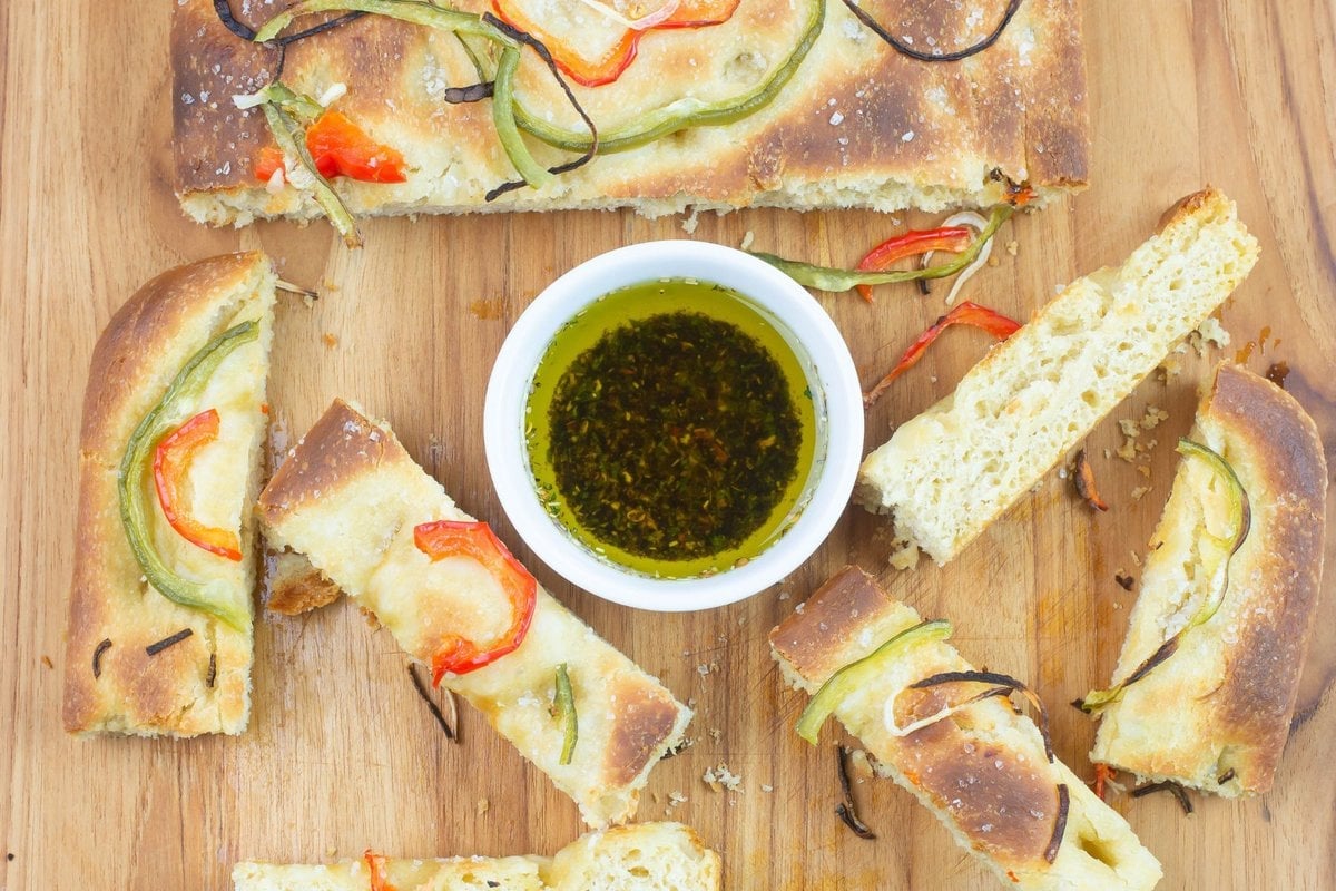 Cut into bread sticks and served with a bowl of bread dipping oil.