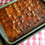 a 9x12 baking pan filled with homemade baked beans