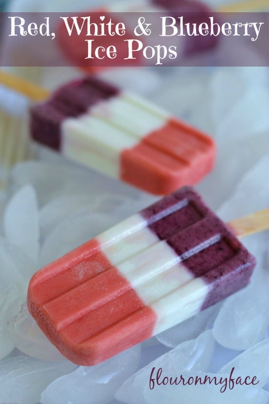 Three layered fresh strawberry, blueberry and coconut milk ice pops that are dairy free
