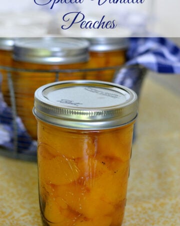 Spiced Vanilla peaches in a canning jar.