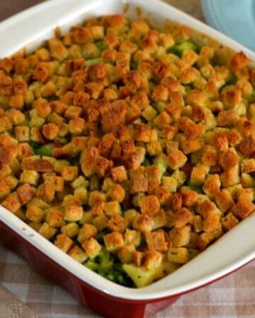 Old Fashioned Broccoli Casserole fresh out of the oven in a casserole dish.