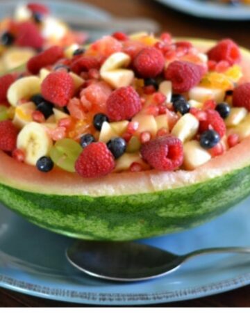 Pomegranate Fruit Salad served in a half watermelon.