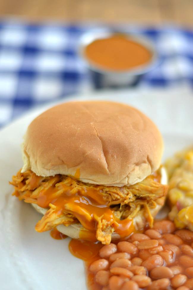 Crock Pot Pulled Chicken Carolina Style BBQ with beans and a grilled corn casserole on the side via flouronmyface.com