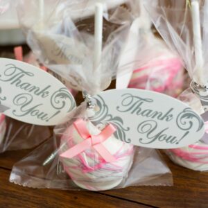 Pink and Grey cake pops wrapped in cellophane for a girl baby shower.