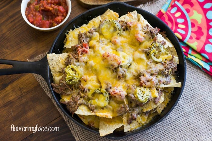 Shredded Beef Nachos recipe is a perfect appetizer or a meal via flouronmyface.com