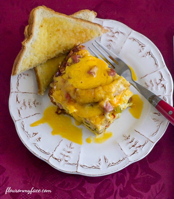 Crock Pot Breakfast Casserole recipe is perfect for Christmas breakfast or for an after church brunch via flouronmyface.com