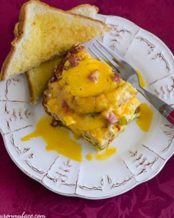 Crock Pot Breakfast Casserole recipe is perfect for Christmas breakfast or for an after church brunch via flouronmyface.com