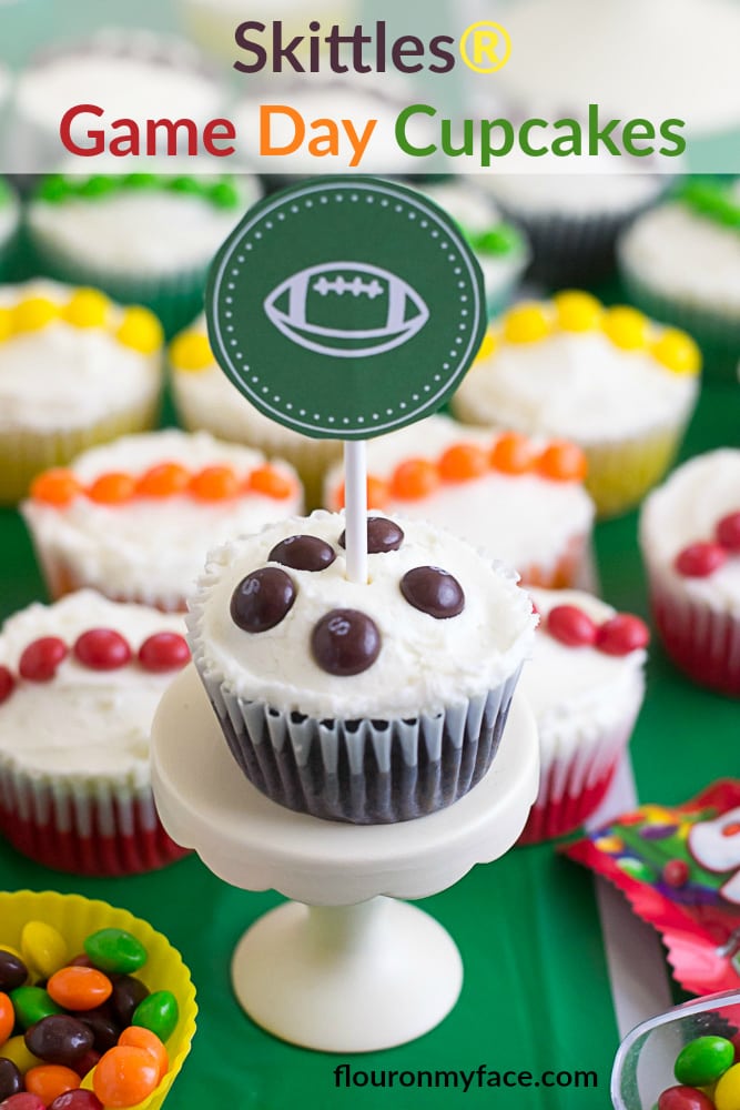 Cheer on your favorite football team with these Skittles Game Day Cupcakes via flouronmyface.com