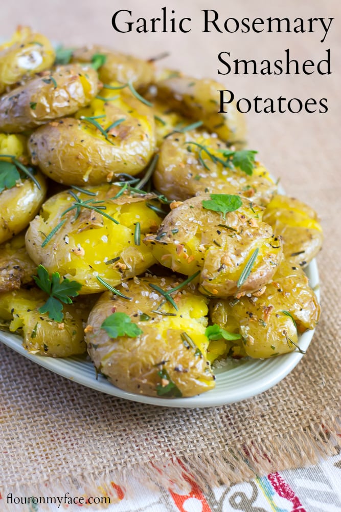 Golden roasted Garlic Rosemary Smashed Potatoes recipe via flouronmyface.com