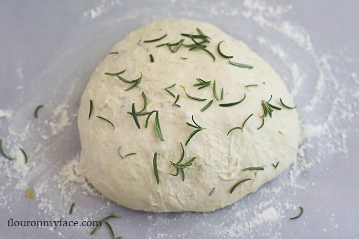 No-Knead bread dough sprinkled with fresh rosemary via flouronmyface.com