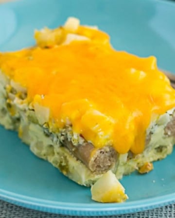 Square serving of Sausage Egg and Cheese breakfast casserole on a plate.