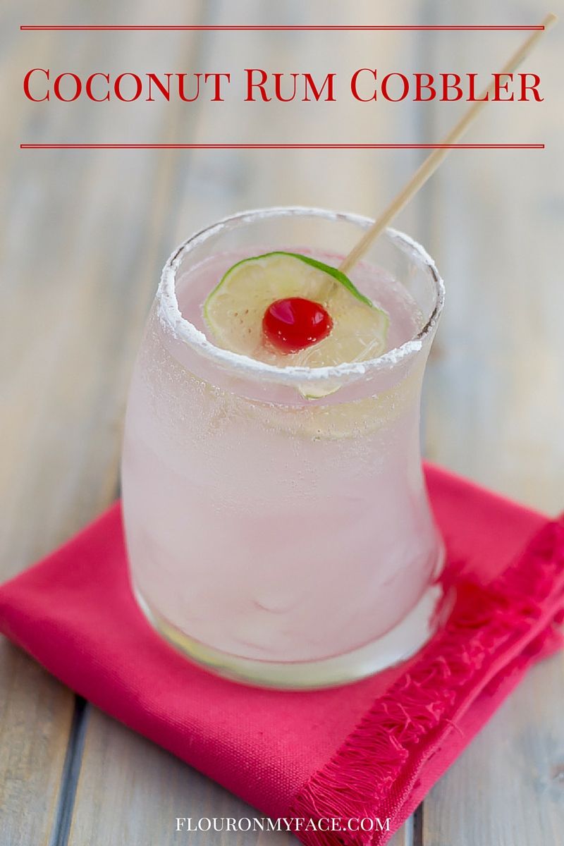 The Coconut Rum Cobbler cocktail recipe is a perfect drink to sip on during the hot summer months via flouronmyface.com