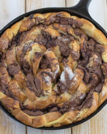 Nutella French Toast Casserole in a cast iron skillet.