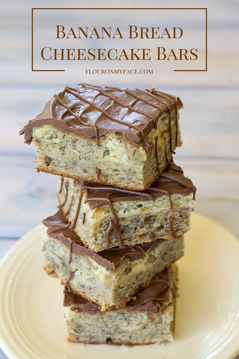 Banana Bread Cheesecake Bars is the best of two worlds-Banana Bread with a cheesecake layer topped with chocolate. You can't go wrong with this sweet dessert bar recipe via flouronmyface.com