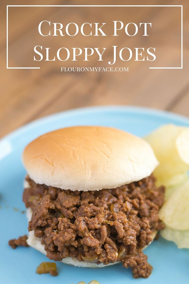 Crock Pot Sloppy Joes recipe served on hamburger buns with chips