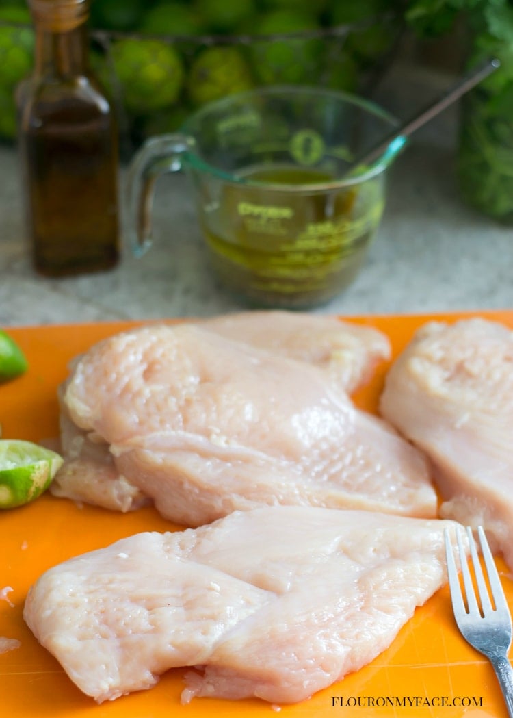 Prep the boneless skinless chicken breast before making Freezer Meals Cilantro Lime Chicken