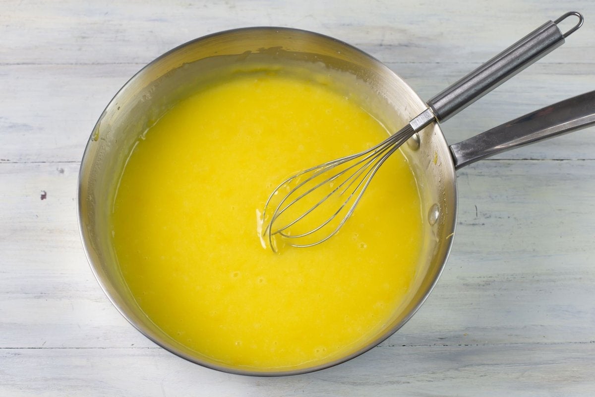 Hot lemon curd in a pan.