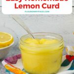 Long vertical image of a jar filled with homemade lemon curd.