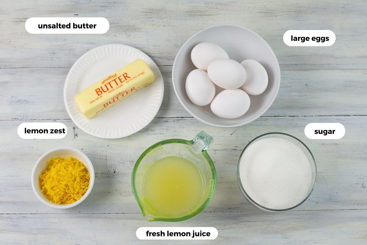 Measure lemon curd ingredients in small bowls.
