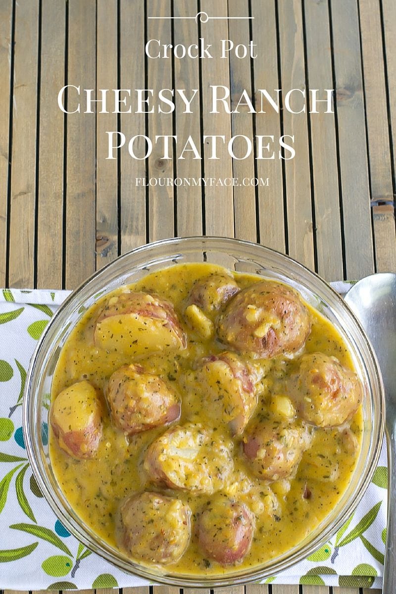 Easy Crock Pot Cheesy Ranch Potatoes recipe made with baby red potatoes via flouronmyface.com