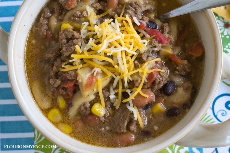 Easy dump and go crock pot recipes are perfect to feed a family on a budget. Crock Pot Hamburger soup recipe makes a great freezer meal that is perfect for your meal planning via flouronmyface.com