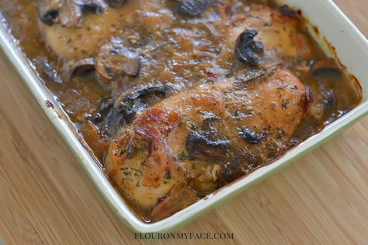 Crock Pot Chicken Marsala recipe in a servong dish after it has been lightly browned under the broiler via flouronmyface.com