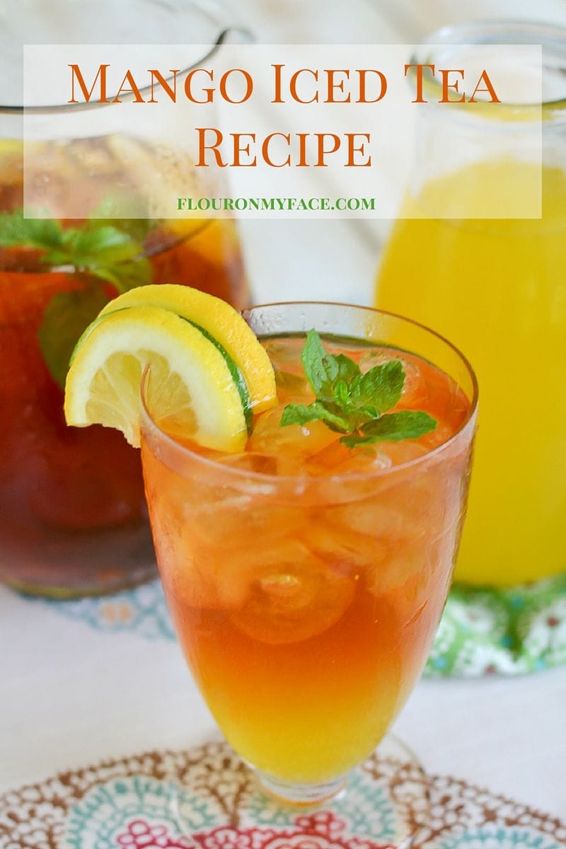 Mango Iced Tea recipe made with a simple syrup flavored with fresh mangoes via flouronmyface.com. This sweet iced tea recipe is perfect for all your summer drinks.
