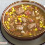Bowl of Crock Pot Southwestern Pork stew via flouronmyface.com