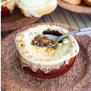 French onion soup in a brown crock.