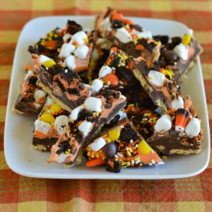 Halloween Cookie Bark pieces on a white plate.