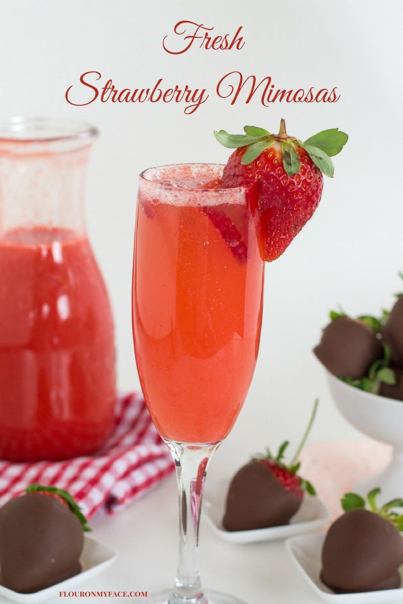 Fresh Strawberry Mimosas recipe is the perfect way to surprise your sweetheart on Valentines Day. Serve him or her a tray with chocolate-covered strawberries and this Strawberry Mimosas recipe for breakfast or brunch via flouronmyface.com