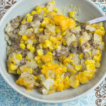 Crock Pot Cowboy Casserole recipe served in a grey bowl